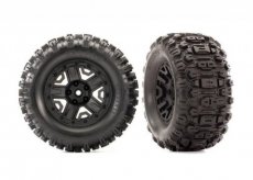 (TRX6792) TIRES & WHEELS, ASSEMBLED, GLUED (2.8") RUSTLER® 4X4 BLACK WHEELS, SLEDGEHAMMER